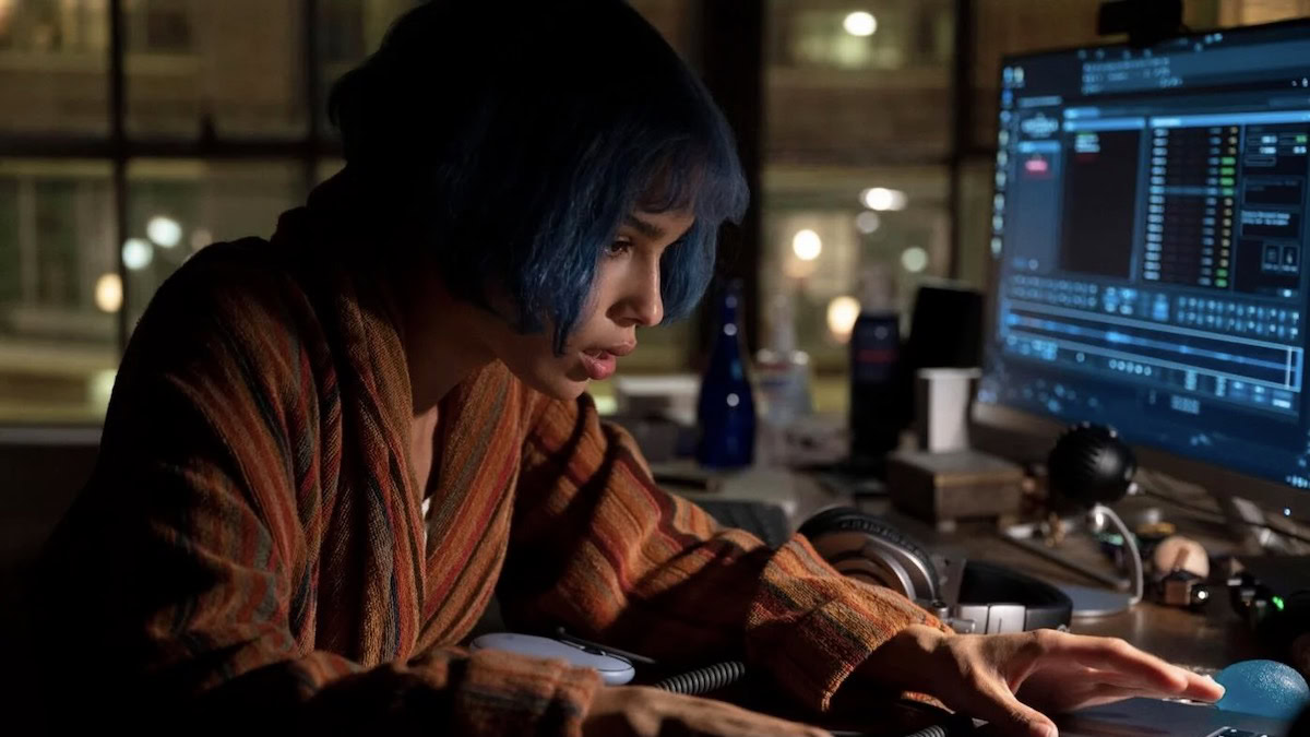Zoe Kravitz sits at a computer in Kimi