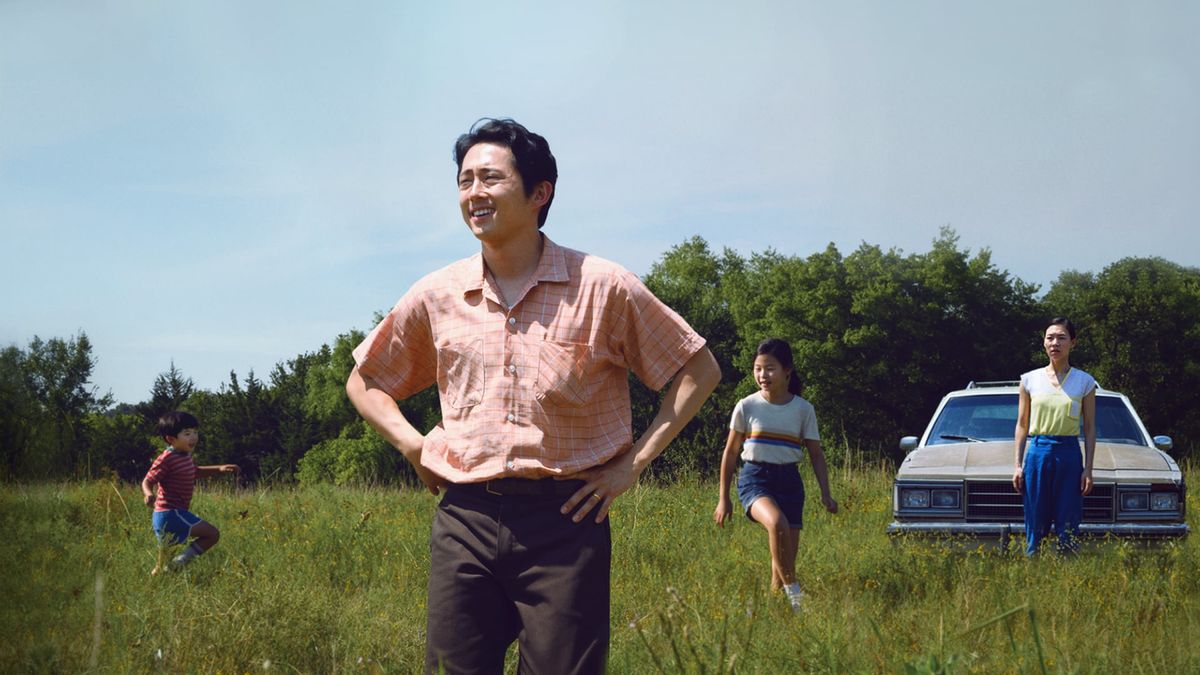 Steven Yeun with his family in a field in Minari - best showtime movies