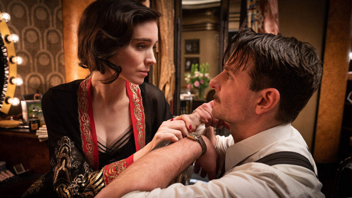 Bradley Cooper and Rooney Mara hold each other in Nightmare Alley — best new streaming movies