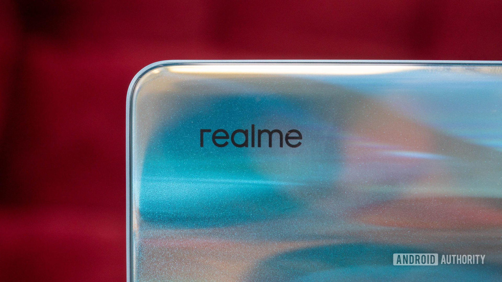 Realme logo closeup on Realme 9 Pro Plus