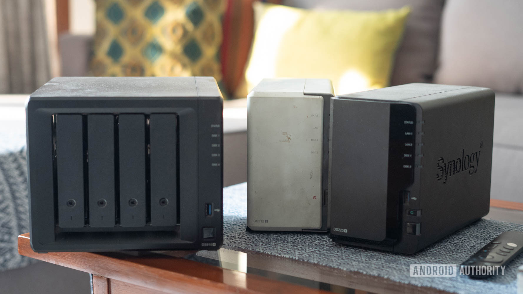 Three Synology NAS boxes placed next to each other