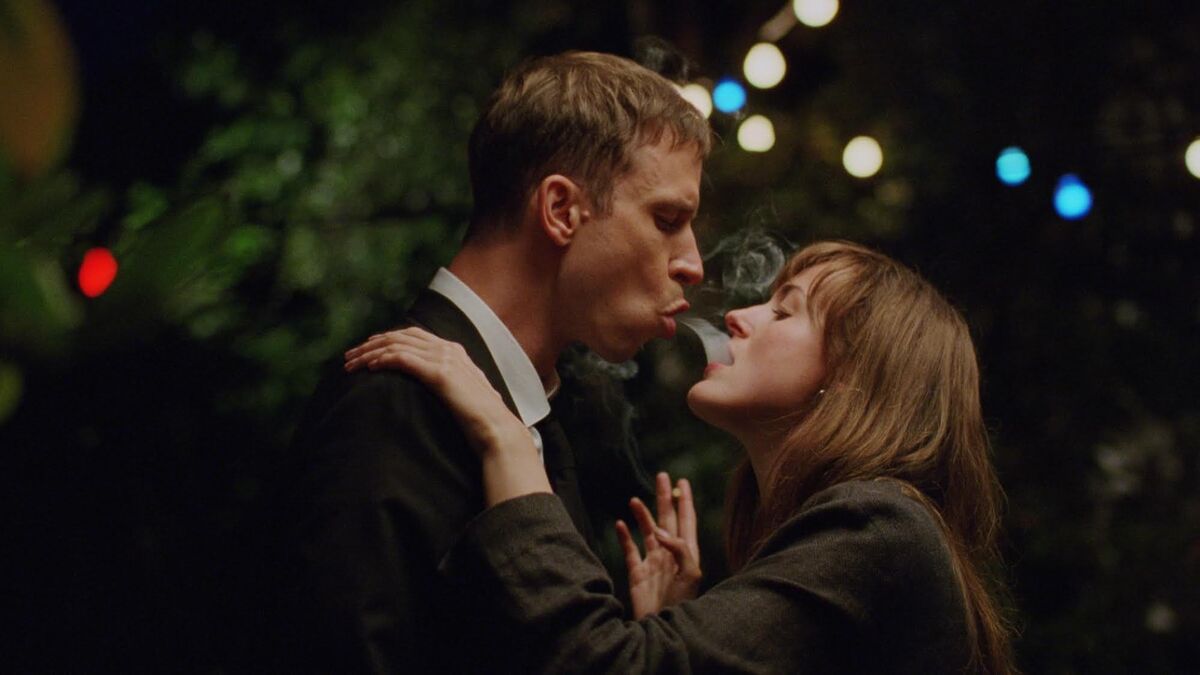 Herbert Nordrum blows smoke into Renate Reinsve's mouth in The Worst Person in the World — Oscar nominations 2022