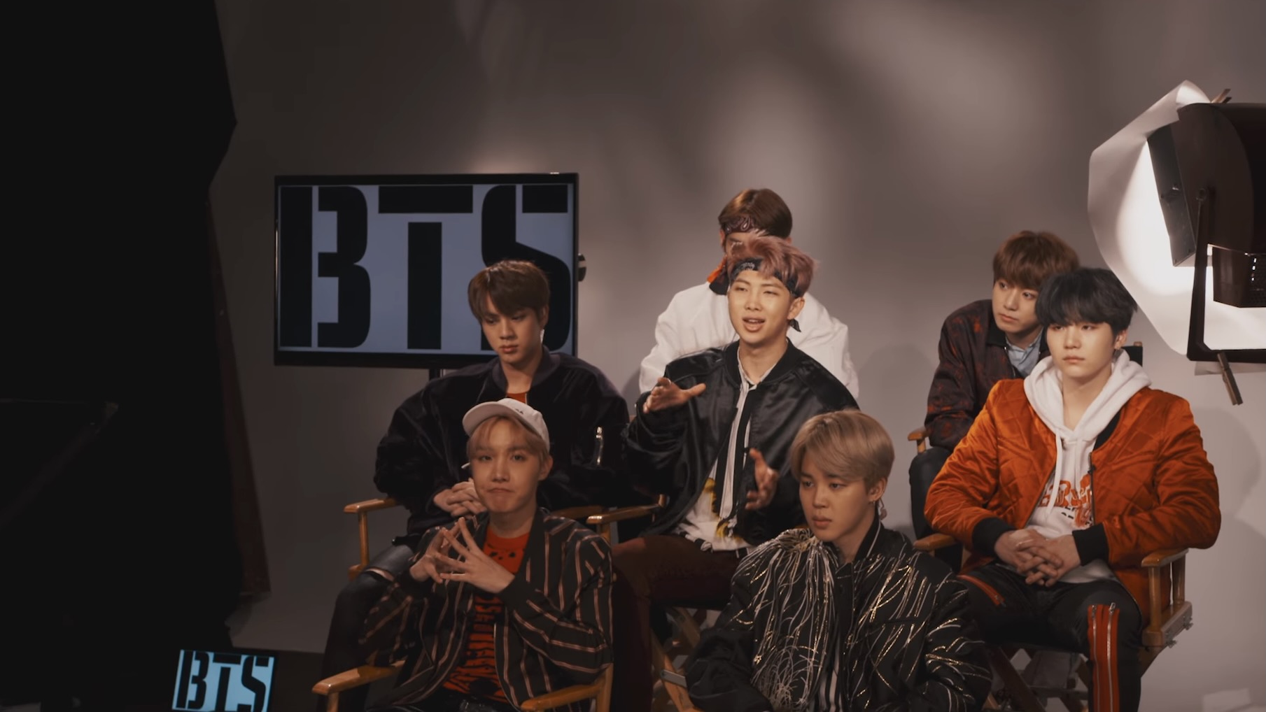 Members of BTS at a press junket in BTS: Burn the Stage - best youtube originals