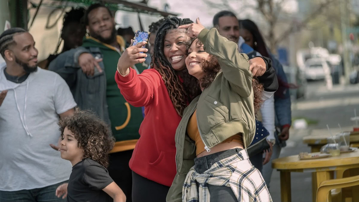 Two women take a selfie in Blindspotting - best starz shows