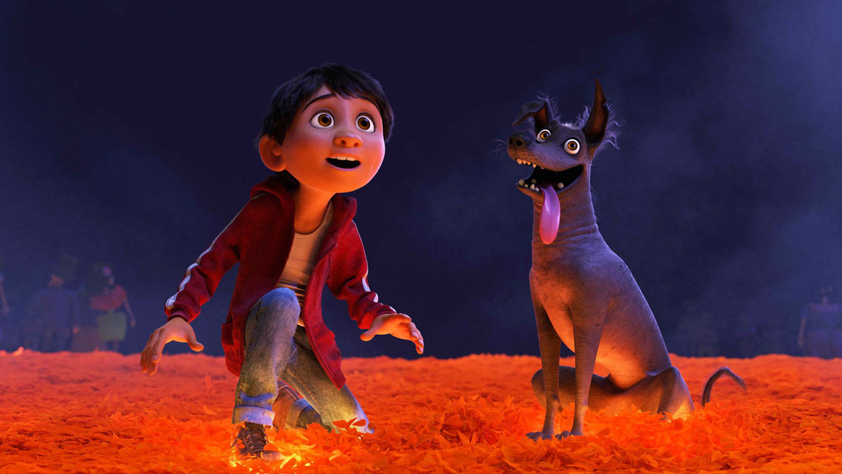 A boy and his dog in Coco - best disney plus family films