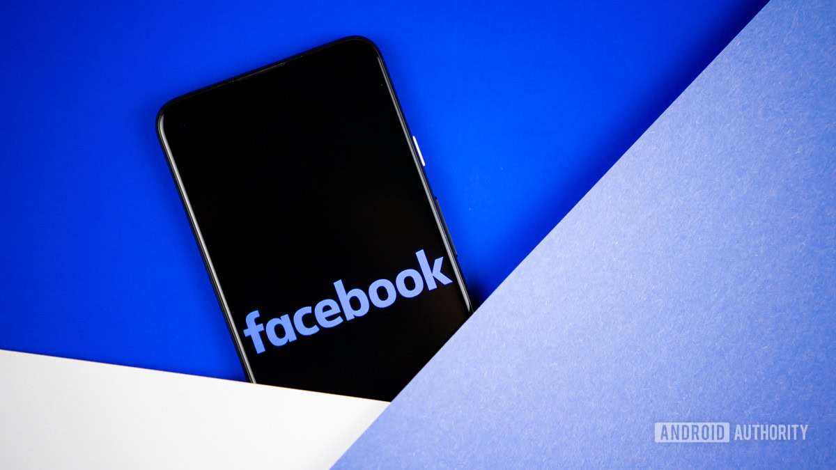 Facebook logo on a phone screen stock photo — How do I sell my used phone?
