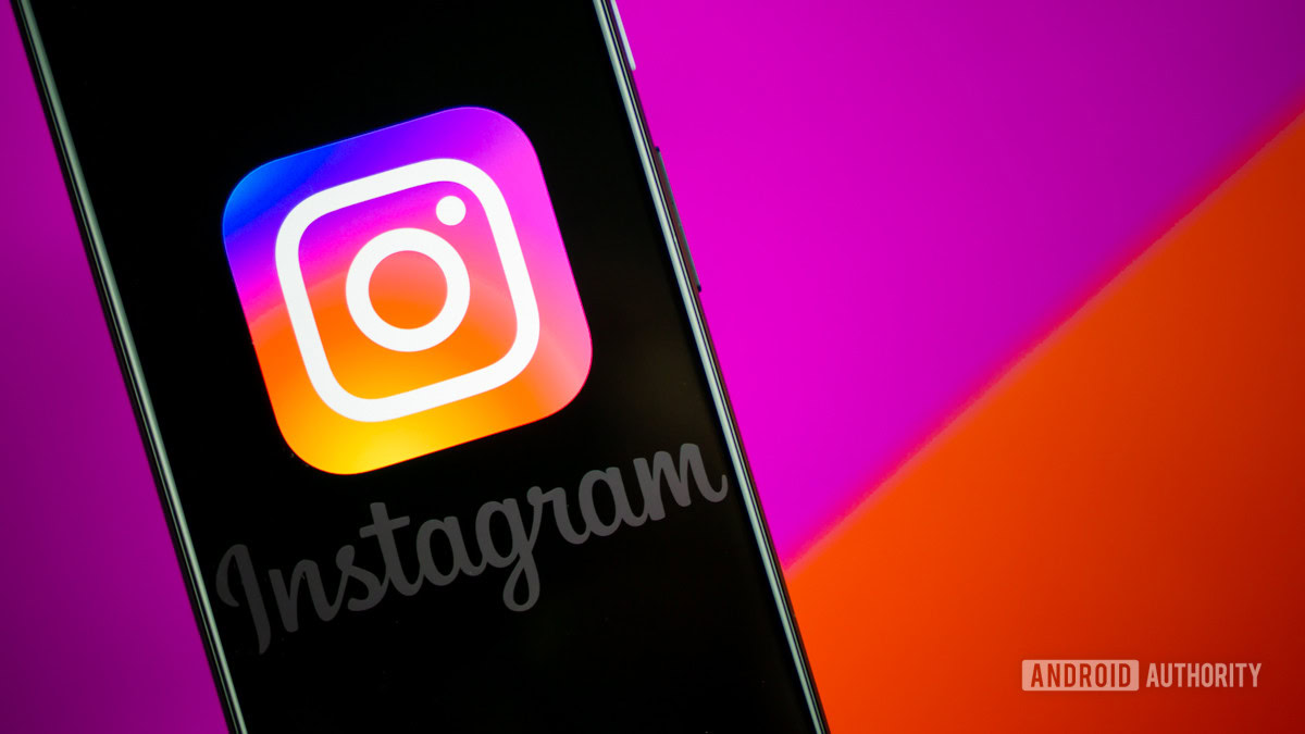 instagram on mobile phone stock photo