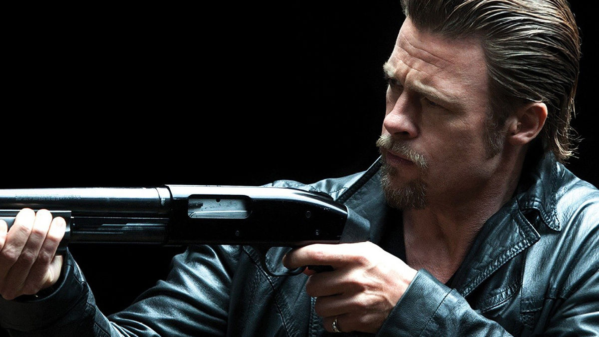 Brad Pitt aims a gun in Killing Them Softly - new streaming movies