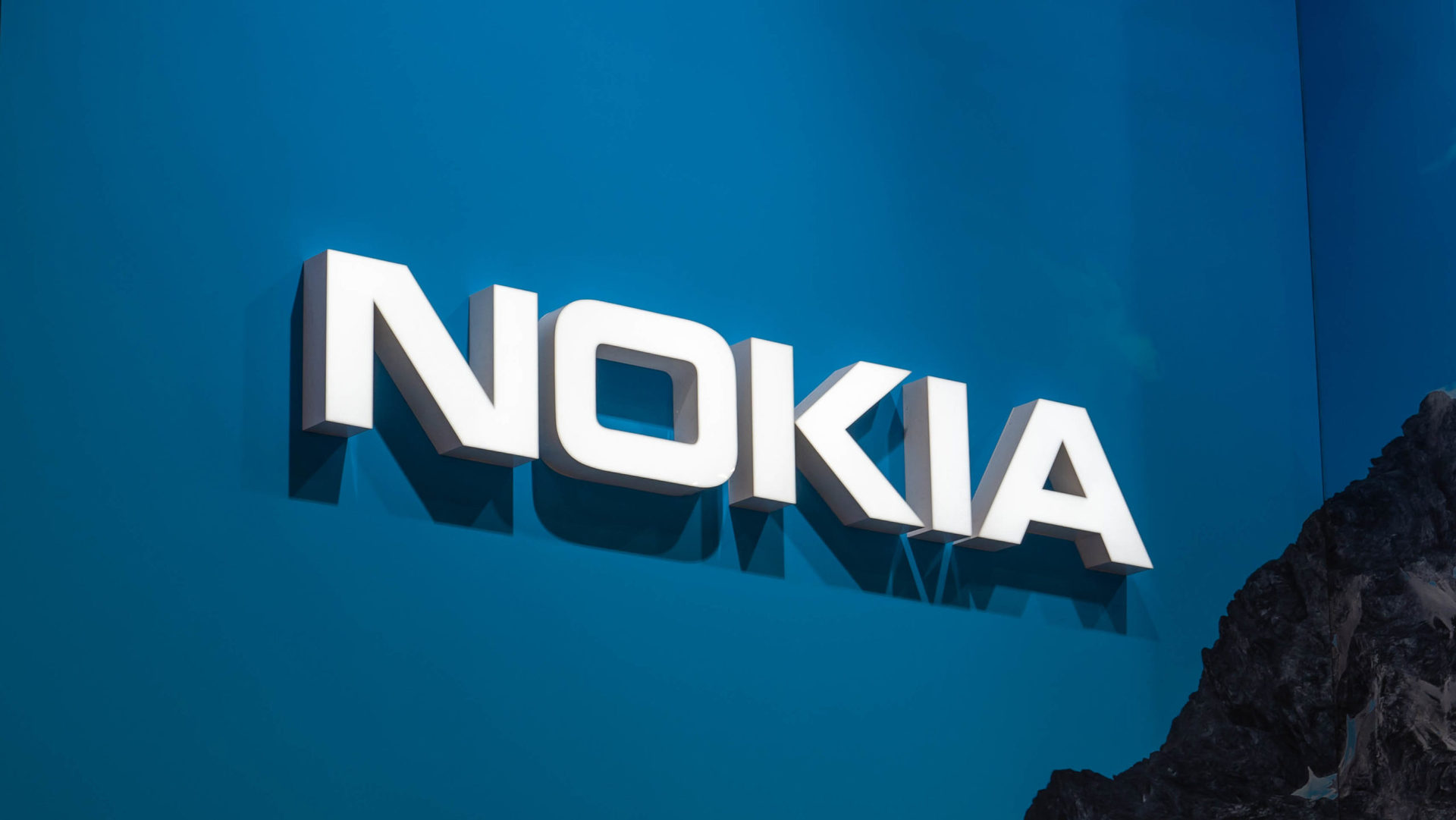 Nokia logo on blue wall - MWC