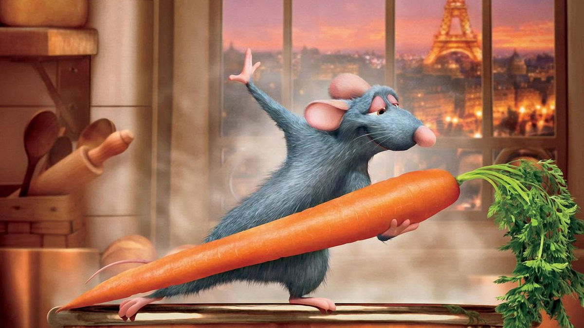 Remy dances with a carrot in ratatouille - best disney family films