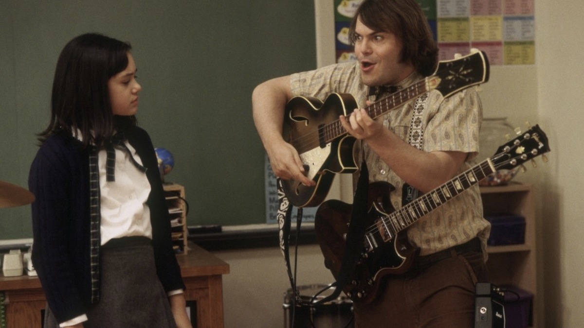 Jack Black teaches a kid guitar in School of Rock
