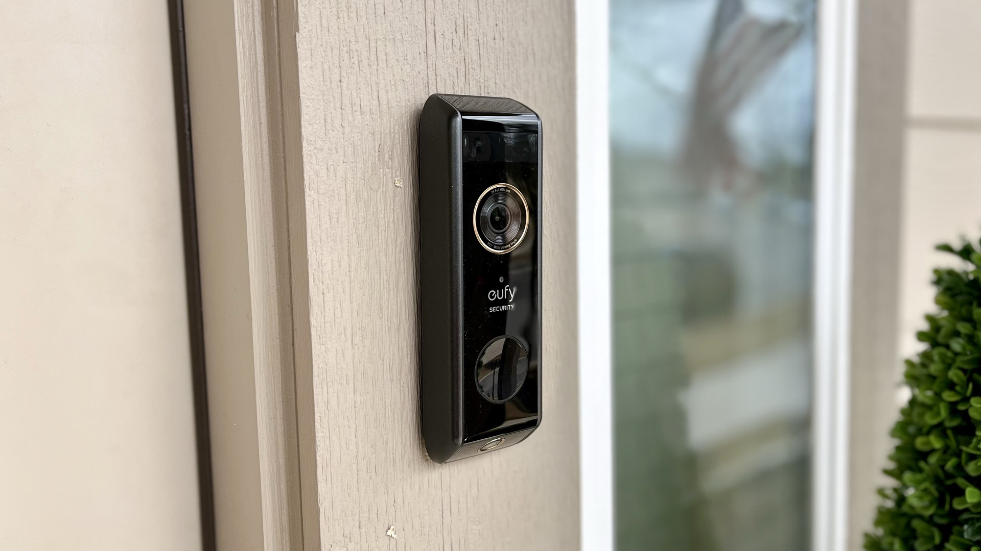 The Eufy Video Doorbell Dual mounted on a doorframe
