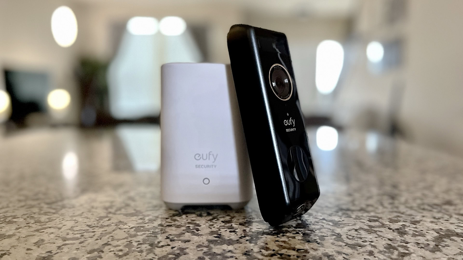 The Eufy Video Doorbell Dual with a HomeBase 2 alongside