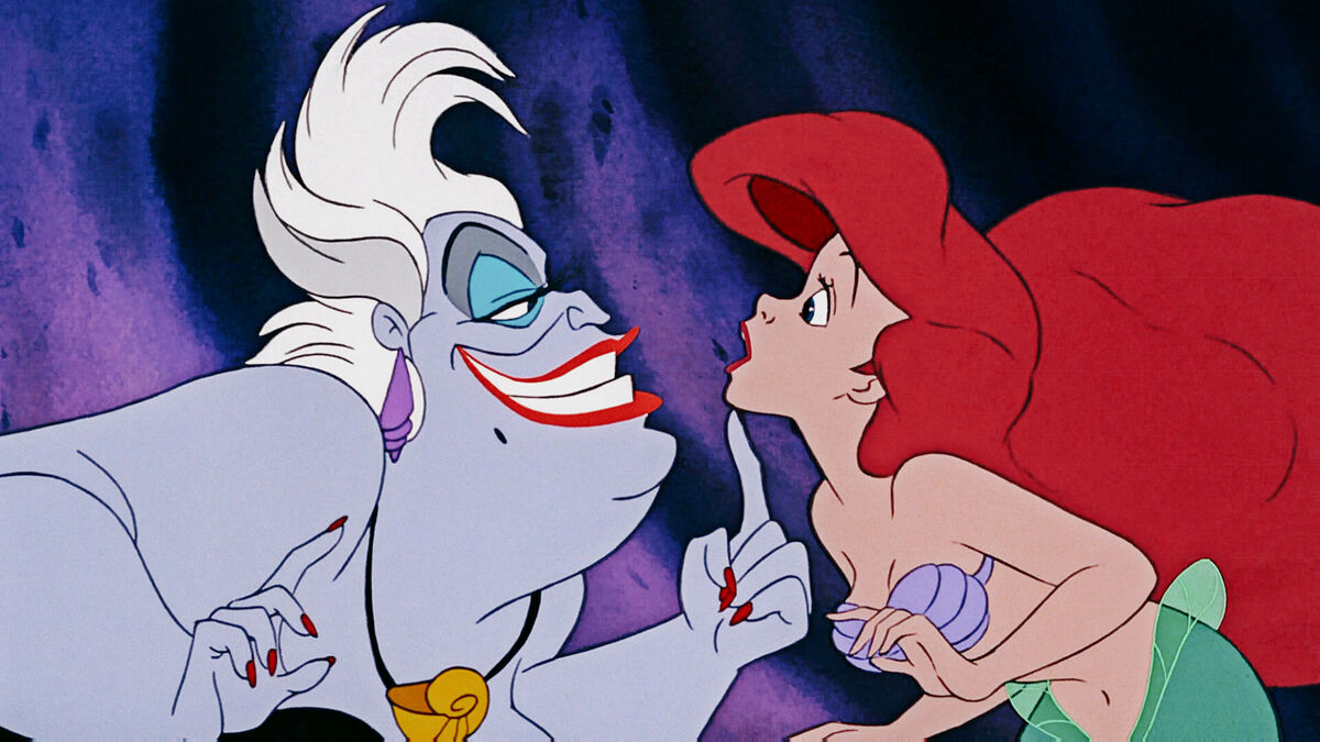 Ursula holds ariel's face in the little mermaid - best family movies on disney plus