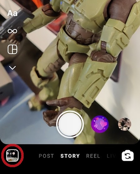 press the gallery button at the bottom of the instagram camera