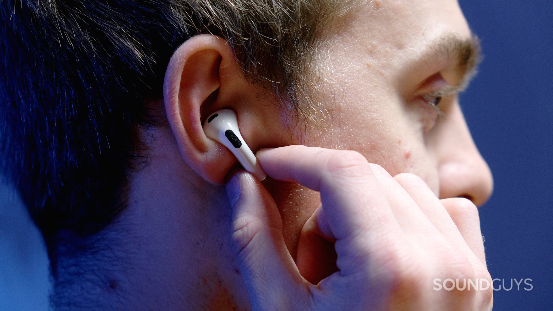 One third-generation AirPod inside an ear.