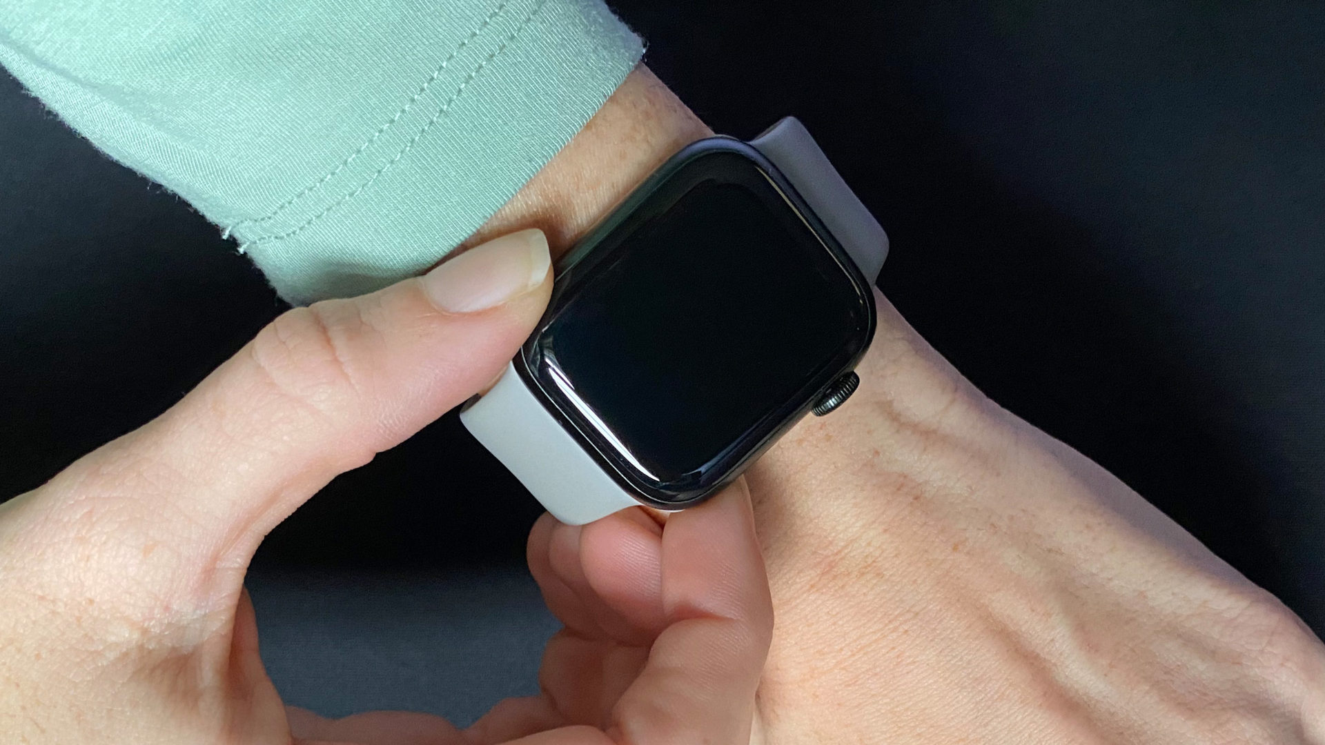 A user showcases the Apple Watch Series 7 on their wrist.
