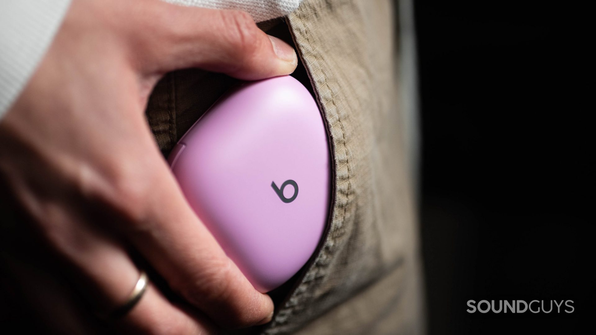 The Beats Fit Pro headphones case in the pocket.