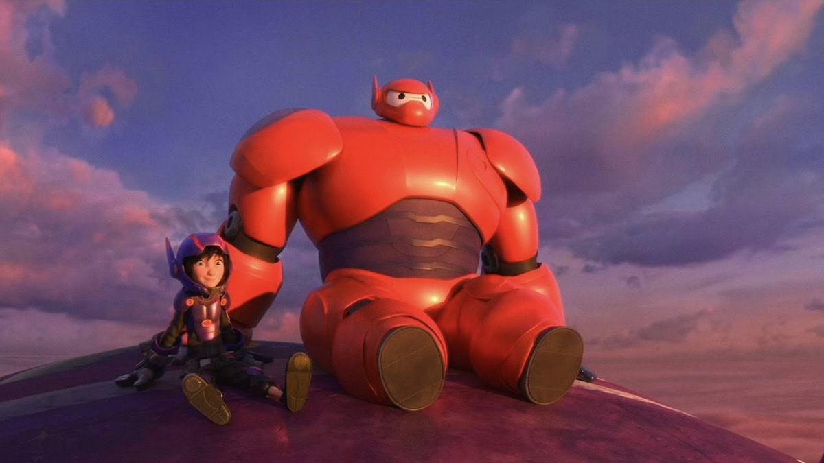 Hiro and Baymax sit on a roof together in Big Hero 6