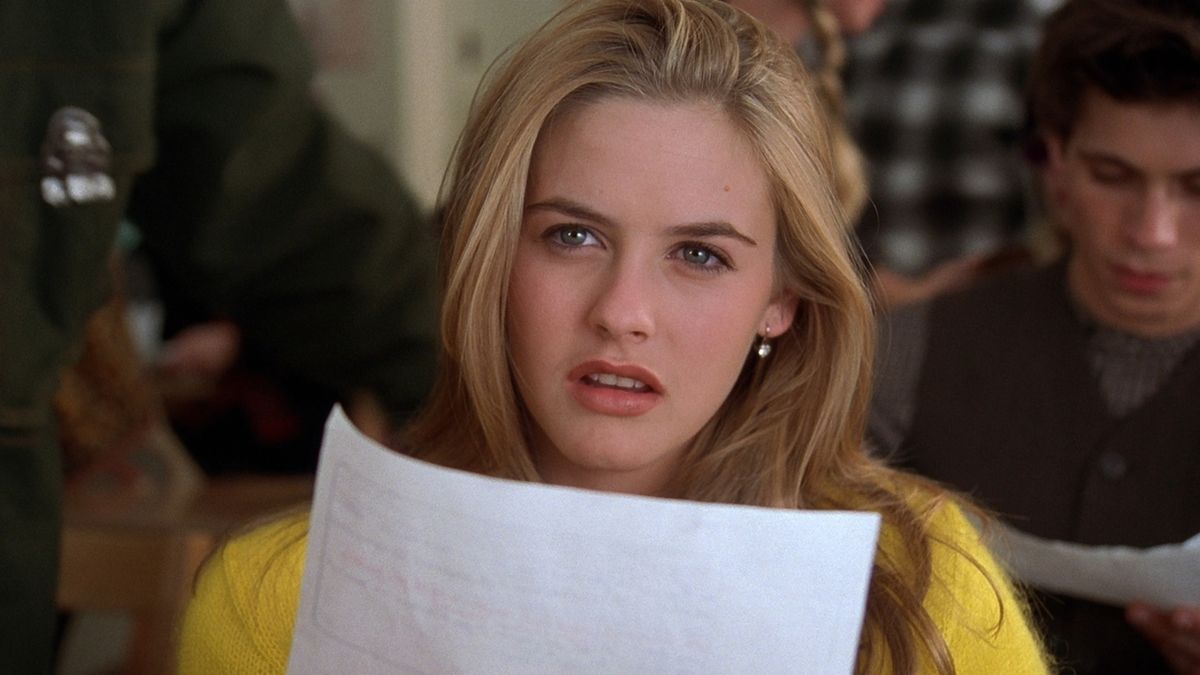 Alicia Silverstone holds a term paper in Clueless - movies leaving streaming services in May