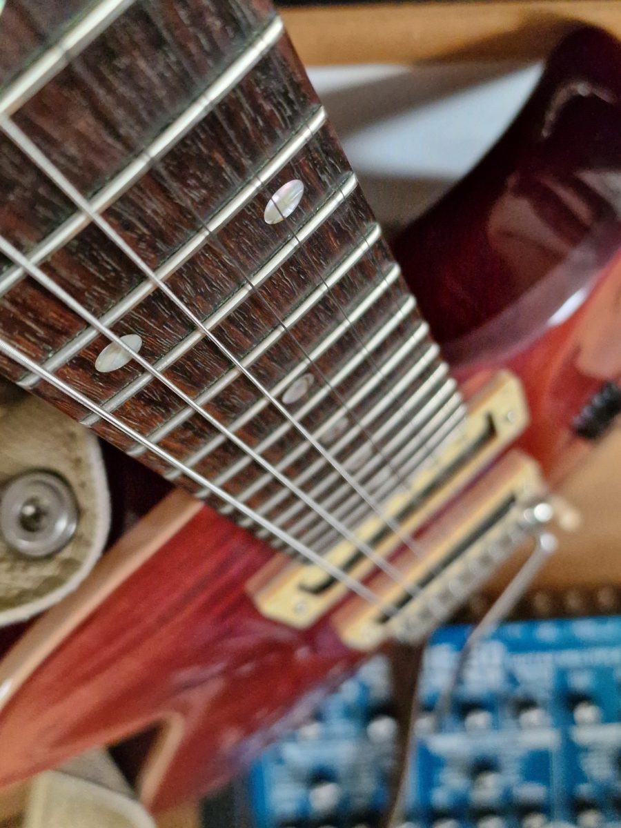 Red guitar macro picture from Galaxy S22 Ultra taken with the default camera app