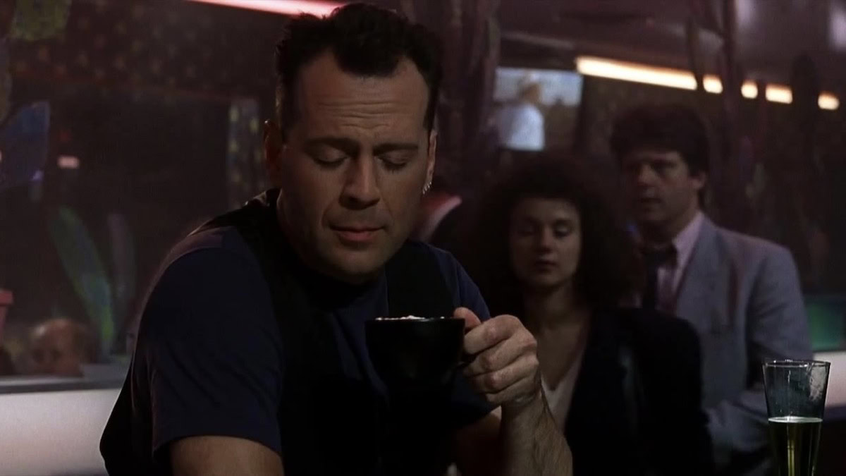 Bruce Willis drinks coffee in Hudson Hawk