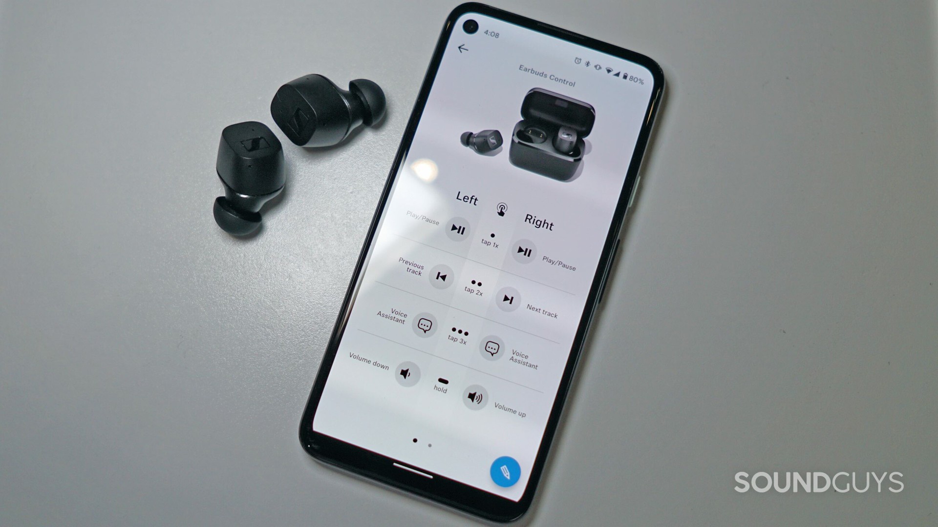 Sennheiser CX True Wireless earbuds next to a phone, with the Sennheiser Smart Control app open on a phone.