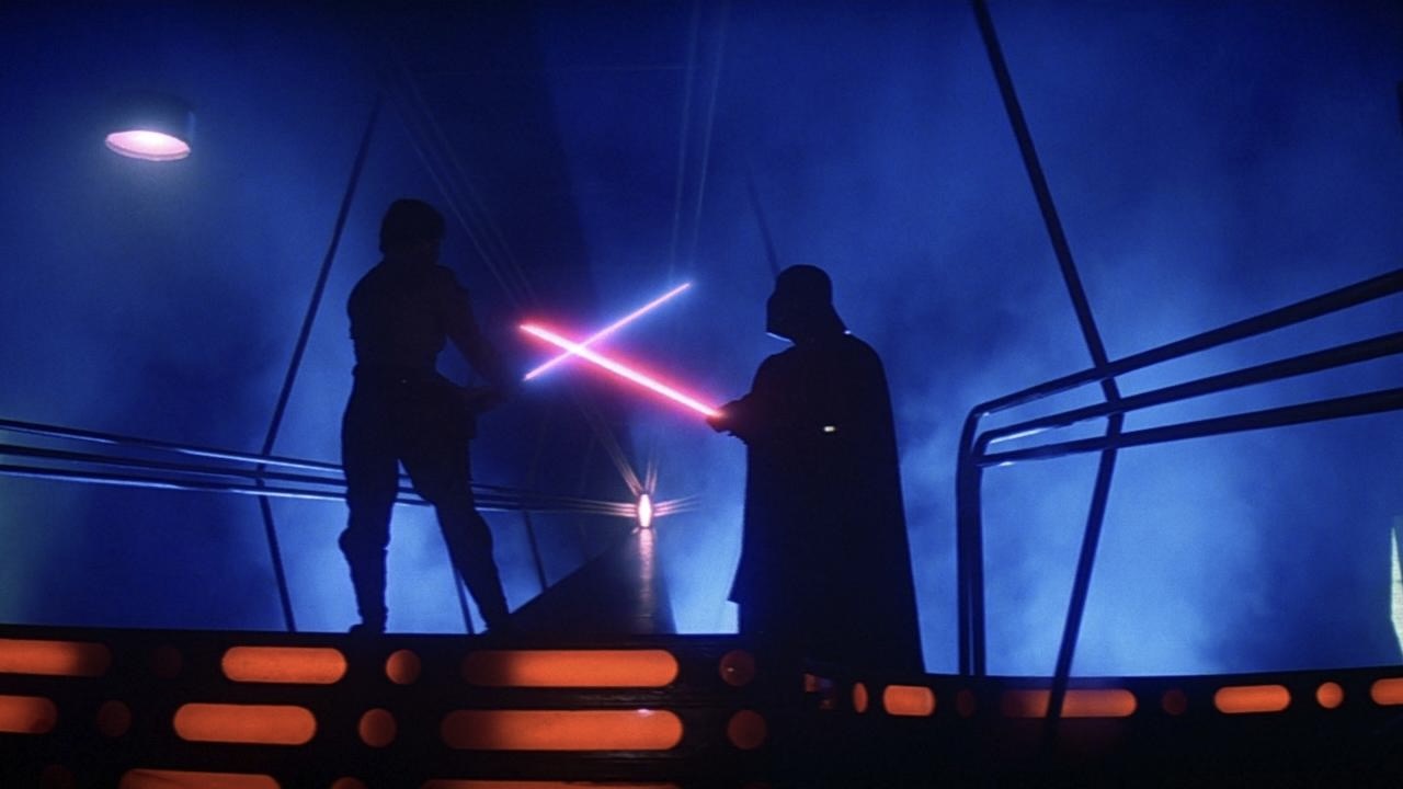 Luke Skywalker and Darth Vader face off with lightsabers in Star Wars Episode V The Empire Strikes Back
