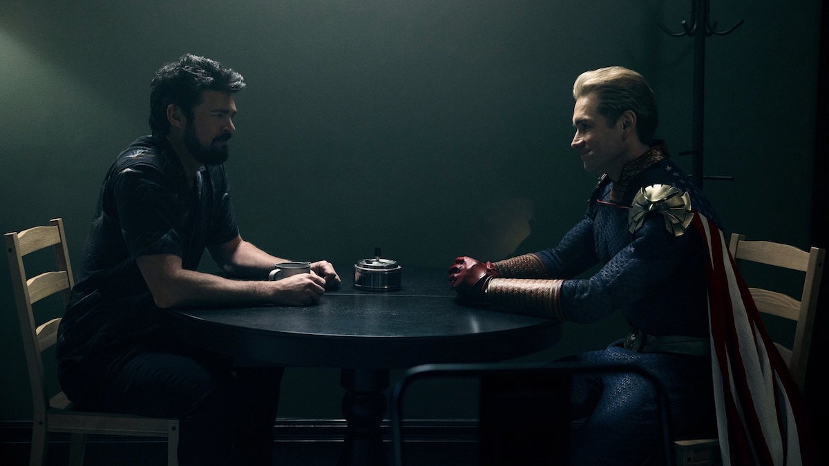 Karl Urban and Antony Starr sit face to face in The Boys season 3 - new on Amazon Prime Video in June