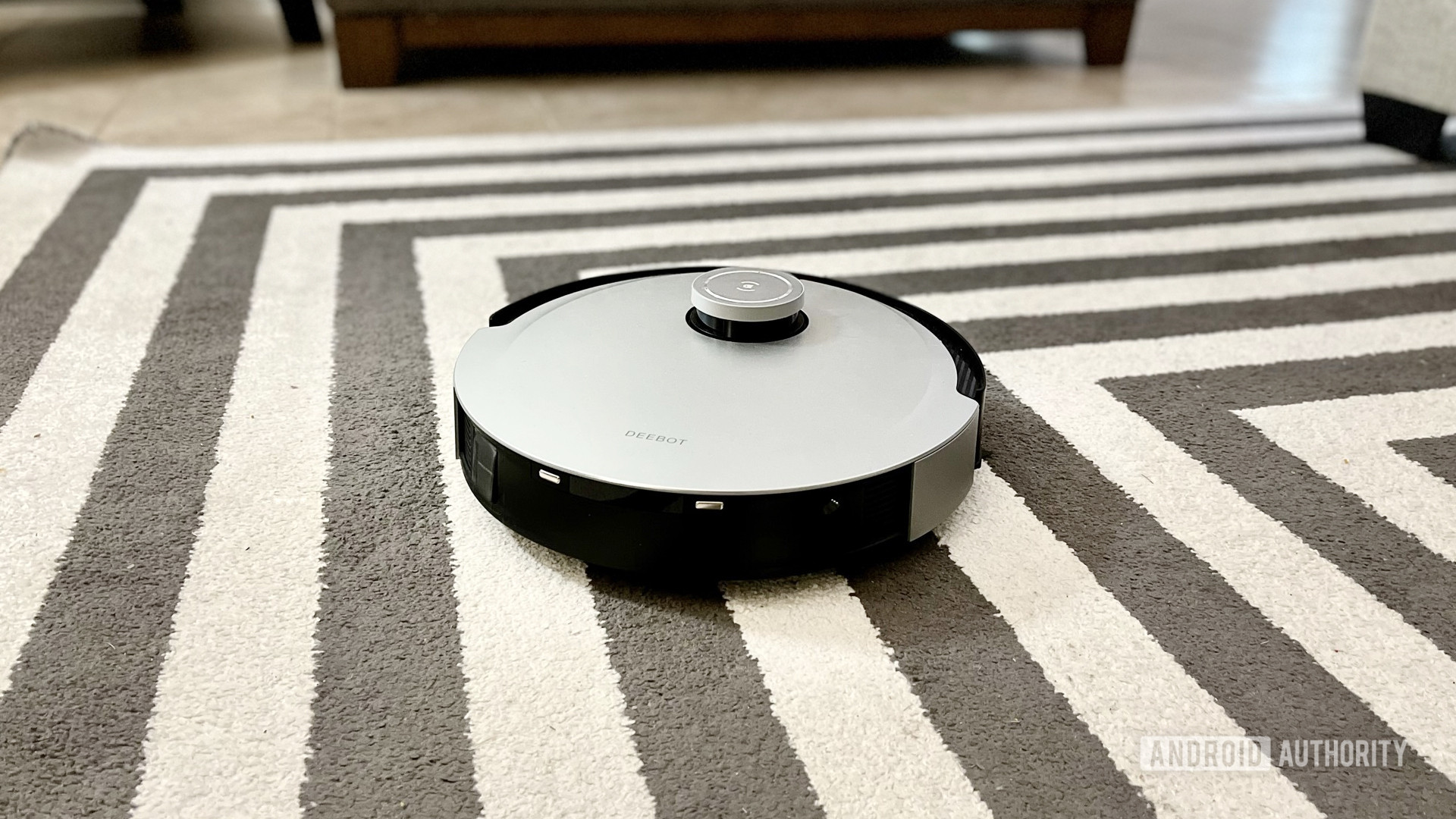 The Deebot X1 Omni cleaning a rug