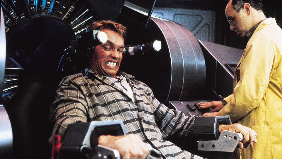 Arnold Schwarzenegger strapped to a chair in Total Recall - movies like severance