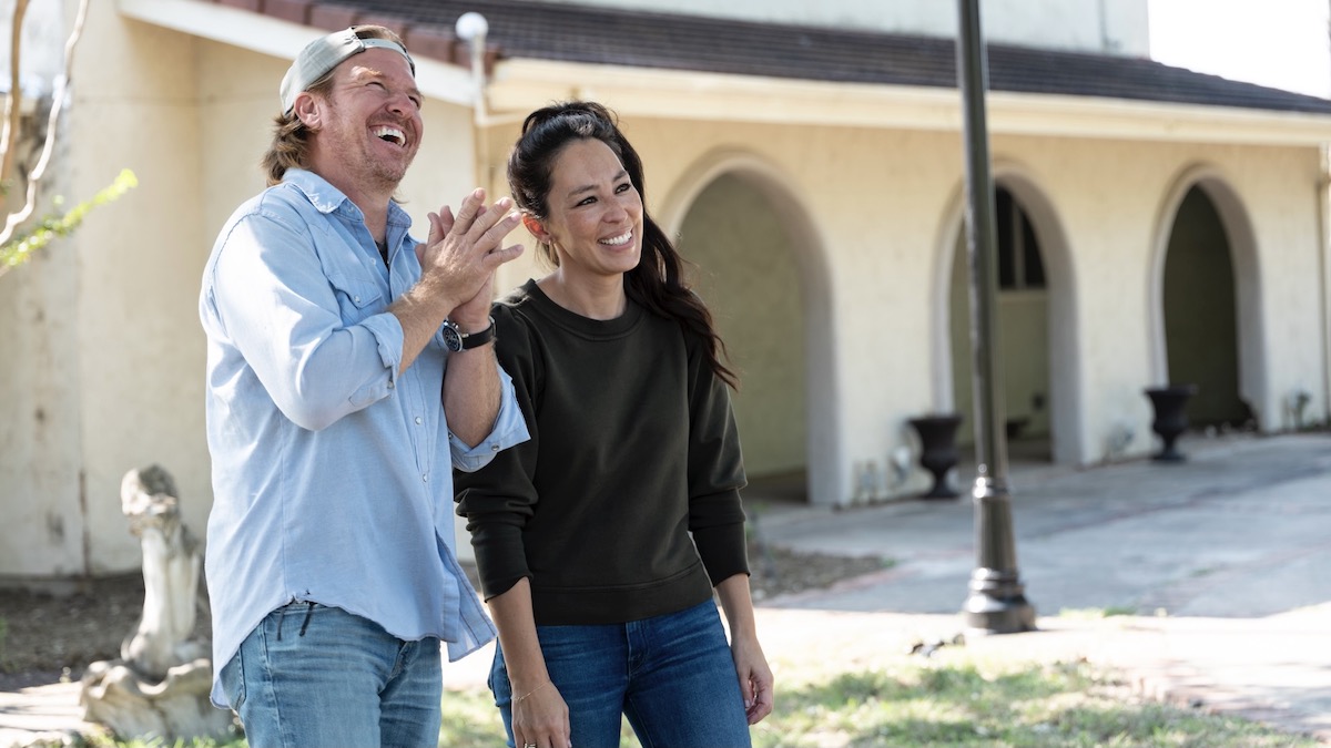 Chip and Joanna Gaines stand outside a house in season 6 of Fixer Upper - shows like selling sunset