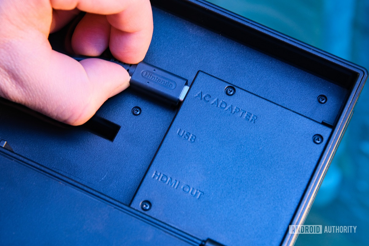 plug usb c into the ac adapter port on the back of your nintendo switch dock
