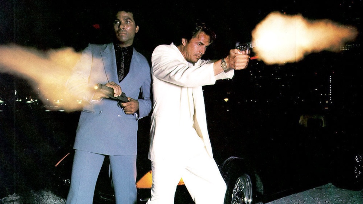 Don Johnson and Philip Michael Thomas firing guns in Miami Vice - shows like tokyo vice