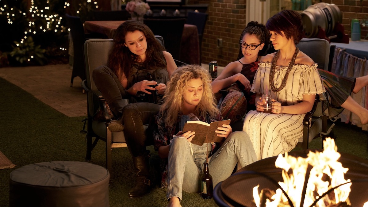 Four identical women in a courtyard in Orphan Black - shows like Umbrella Academy
