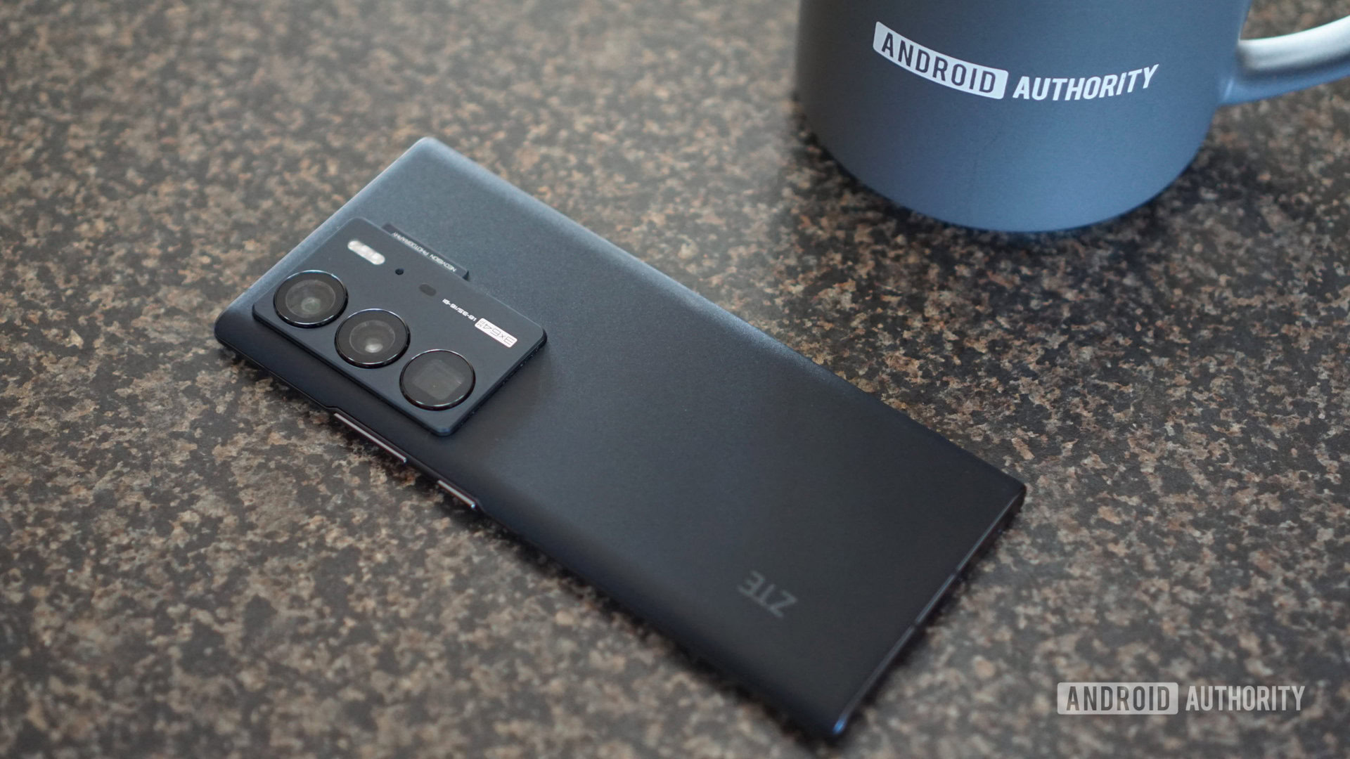 ZTE Axon 40 Ultra face down with mug
