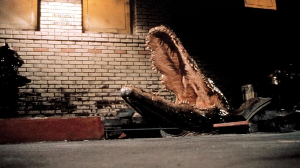 A giant alligator bursts through city streets in Alligator