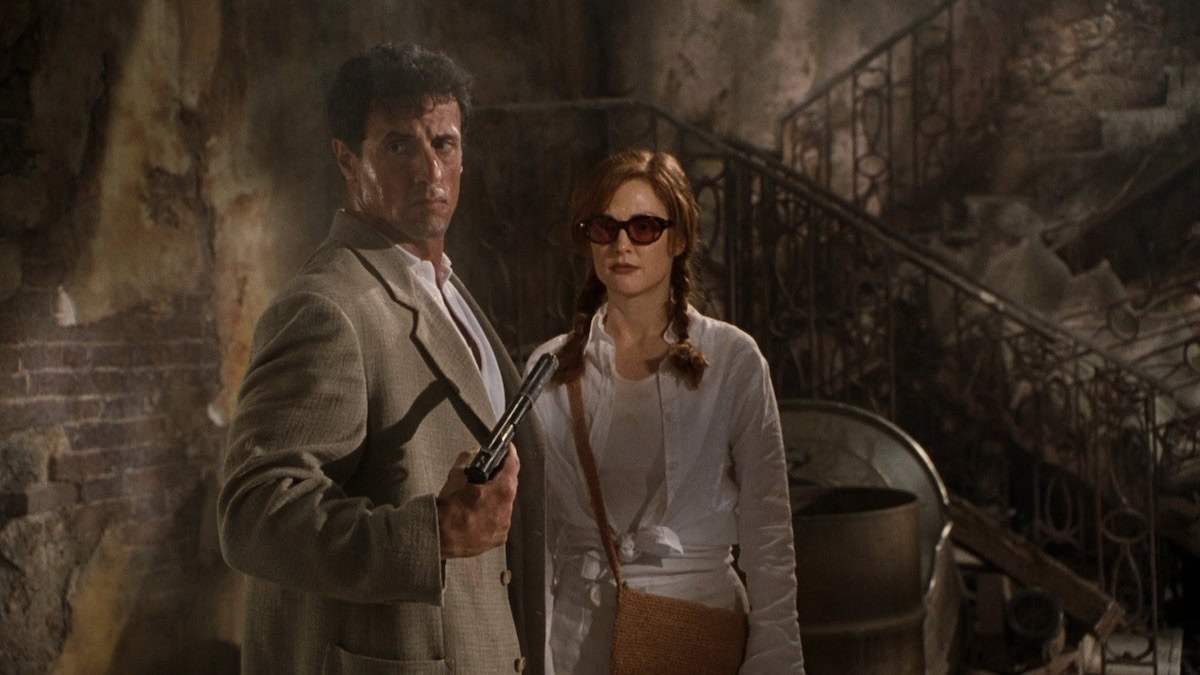 Sylvester Stallone and Julianne Moore in Assassins - movies like Gray Man