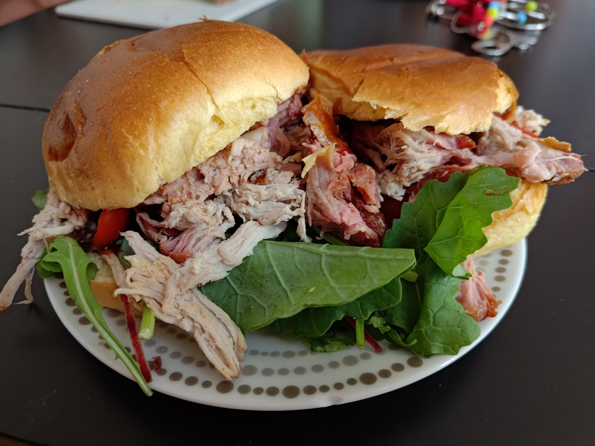 ASUS Zenfone 9 camera sample two sandwich buns on a plate with salad.