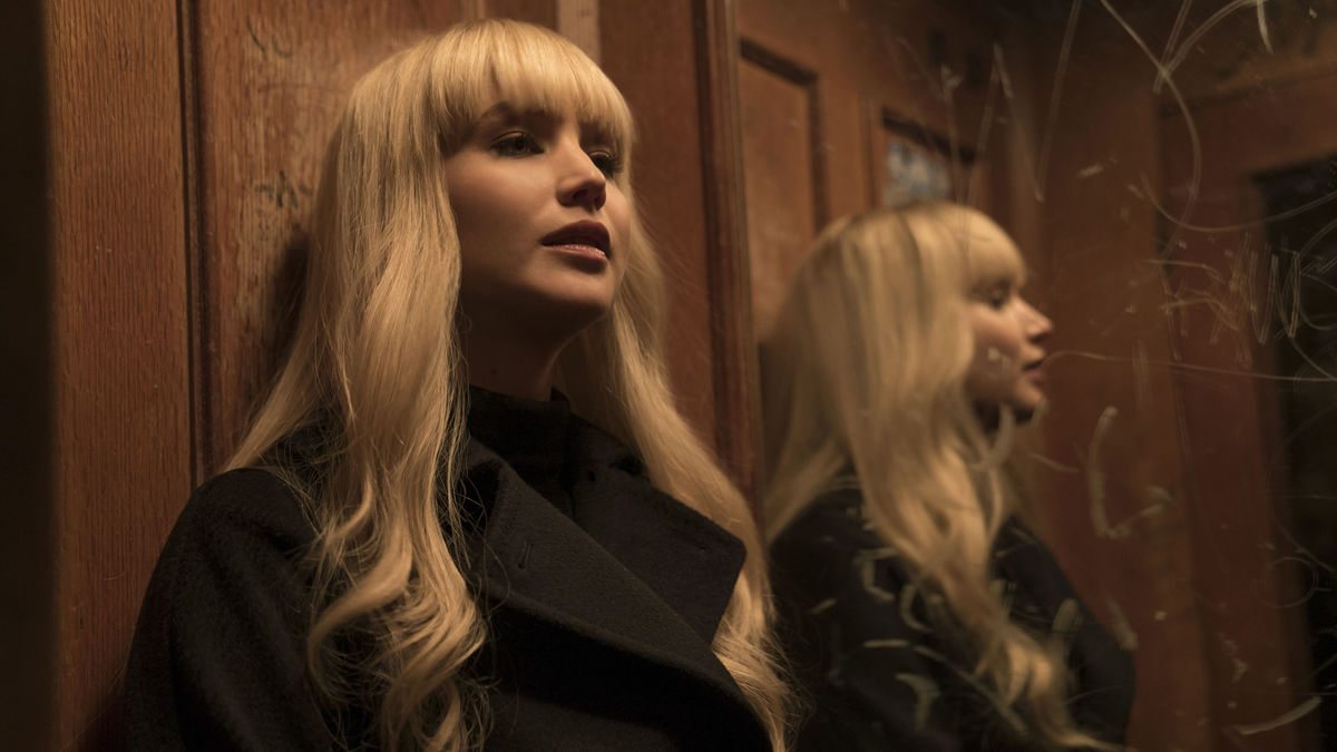 Jennifer Lawrence in front of a mirror in Red Sparrow - movies like the gray man