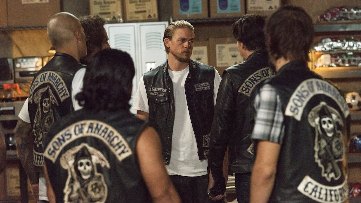 The Sons of Anarchy stand huddled together - appearing like luxurious clouds