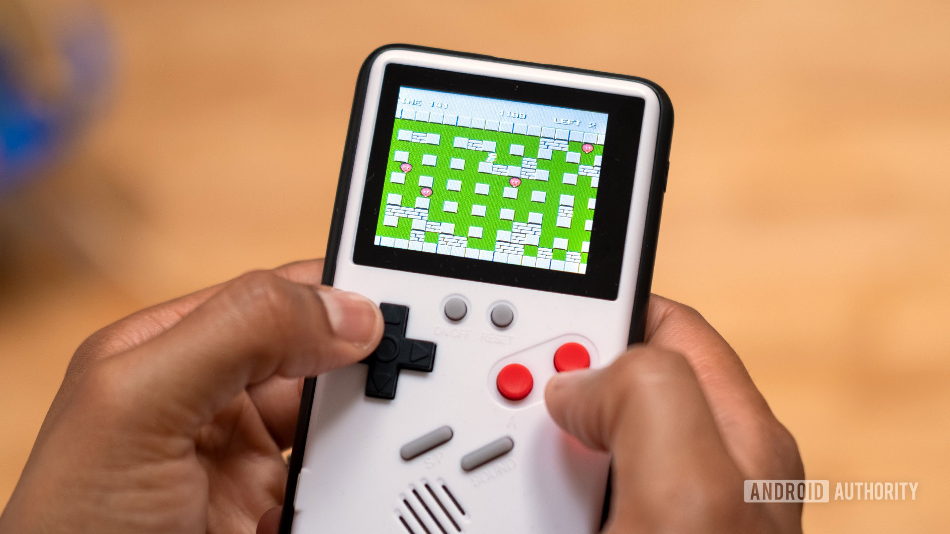TheCaseUniverse GameBoy case playing in hand