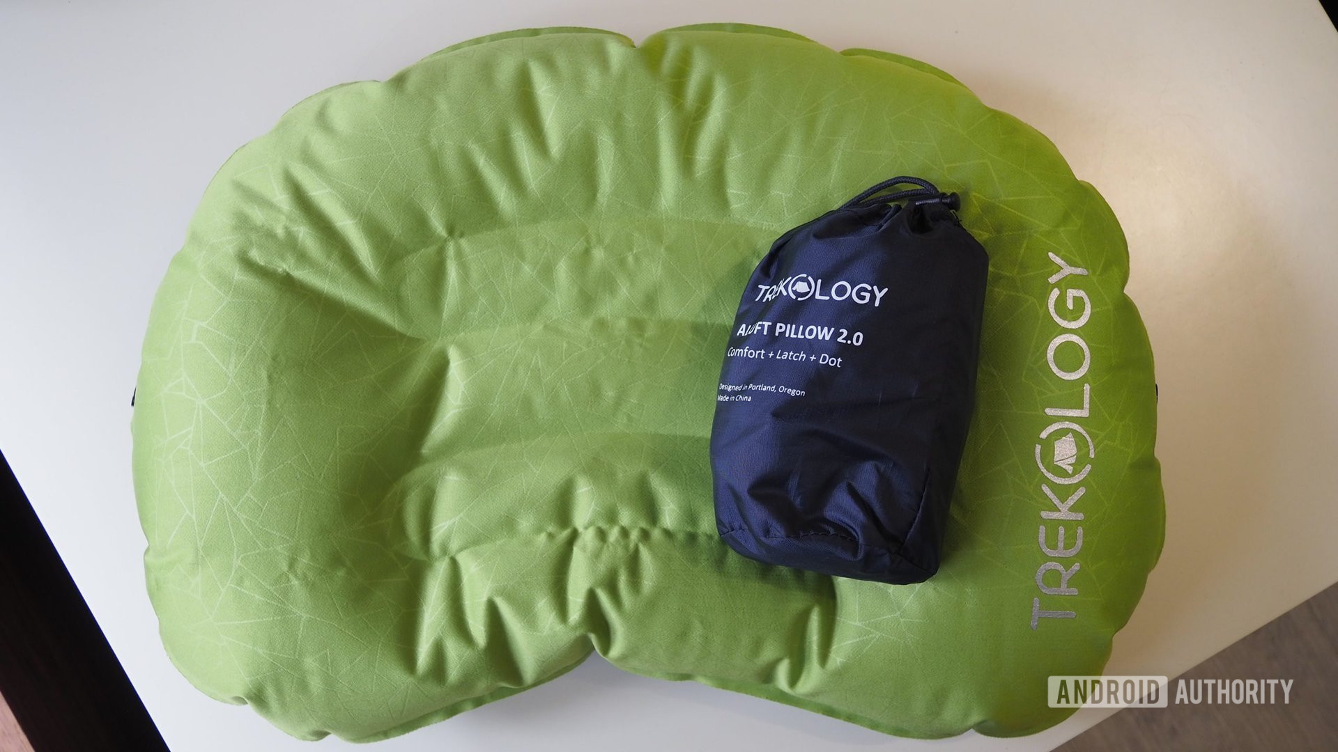 Two Trekology inflatable question   pillows, 1  is inflated, the different   is deflated and successful  a transportation  bag