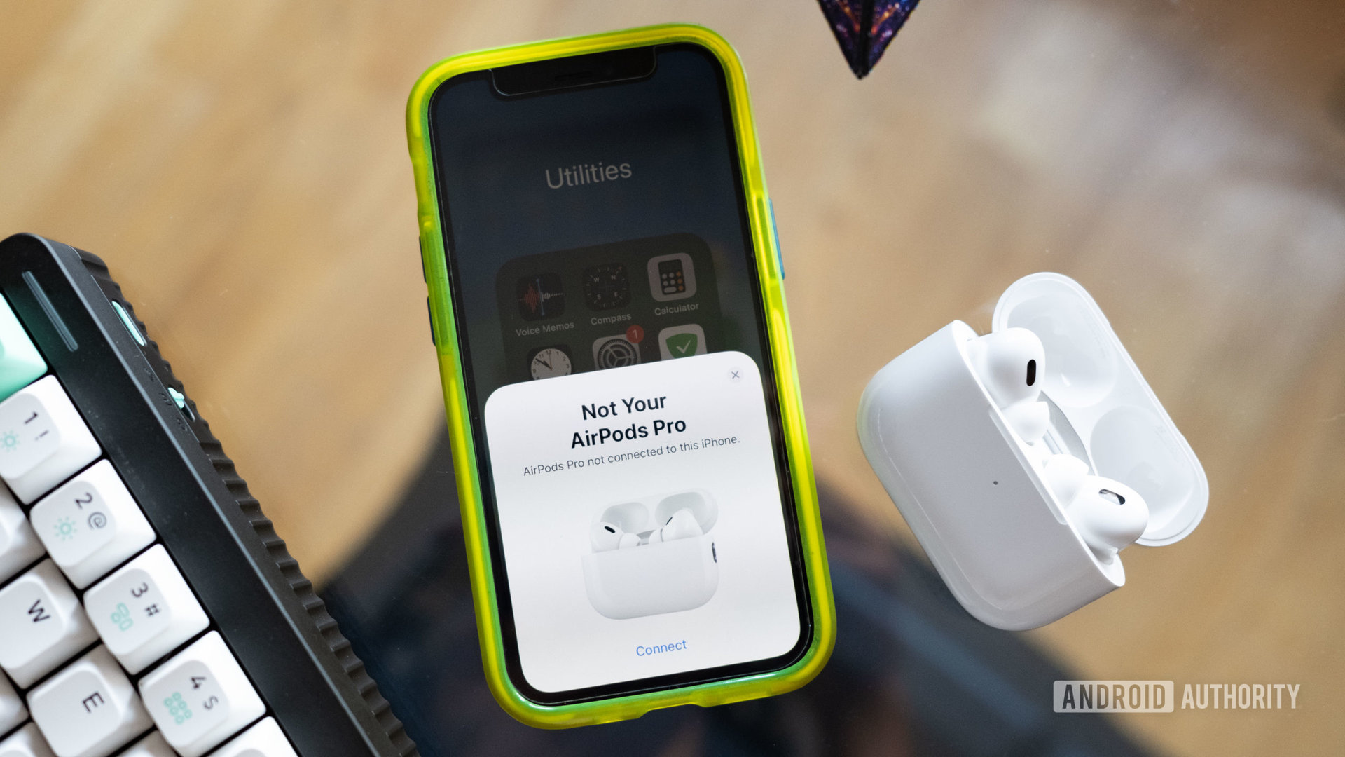 The Apple AirPods Pro 2nd generation pairing with an iPhone 12 mini.