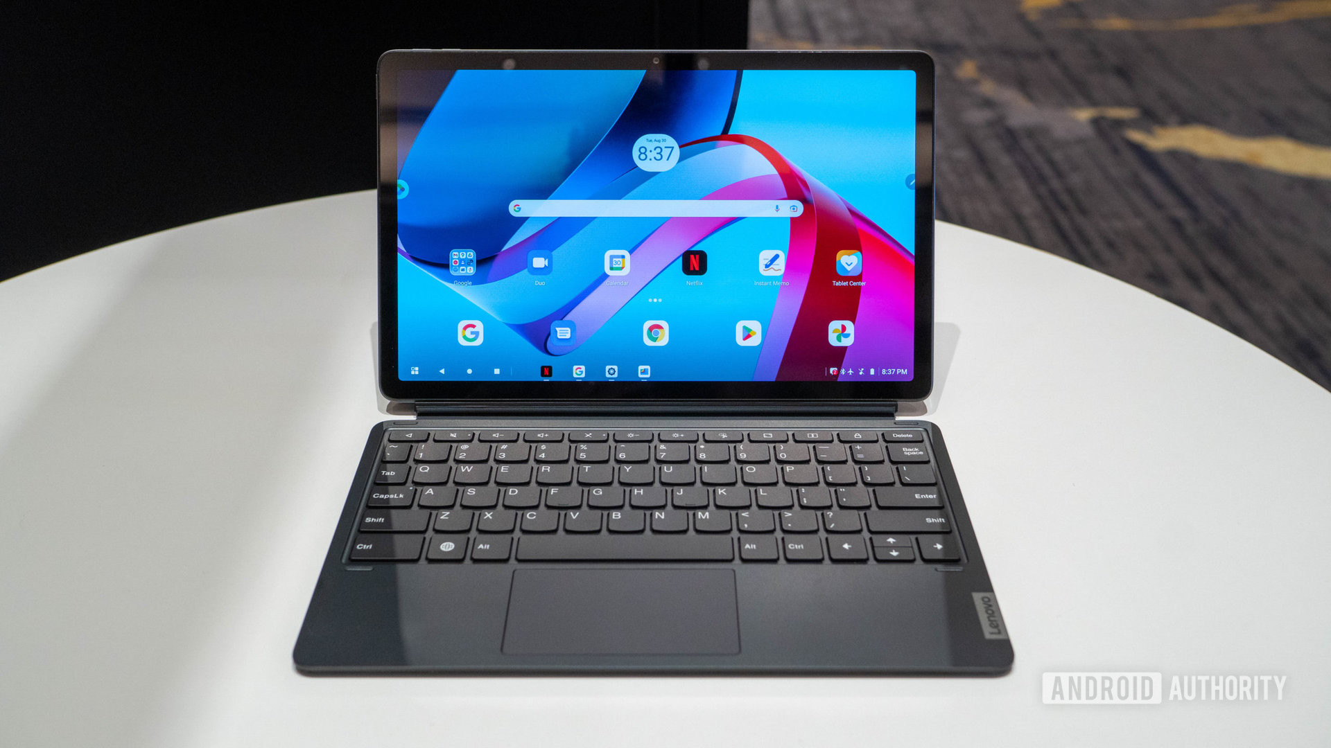 Lenovo Tab P11 Pro front view with keyboard on table