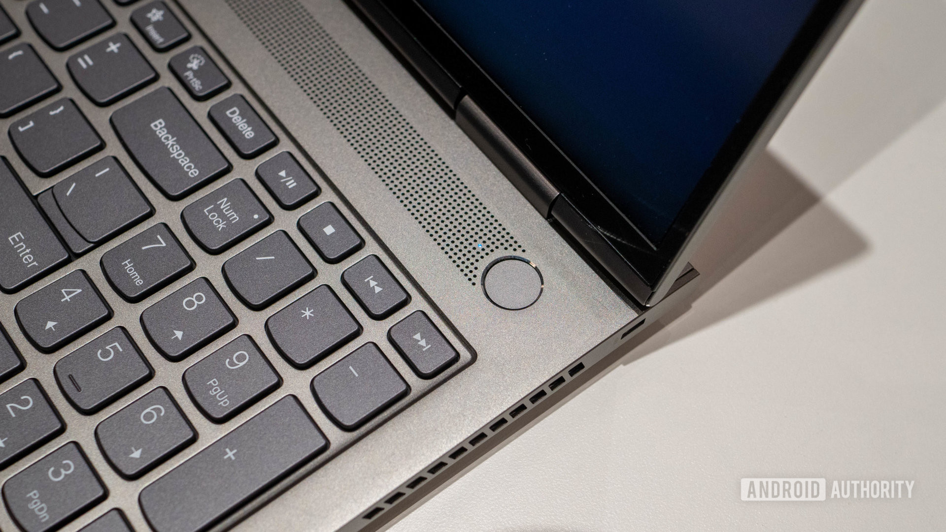 A closeup of a Lenovo ThinkBook 16P Gen 3 showing its fingerprint unlock and keyboard.
