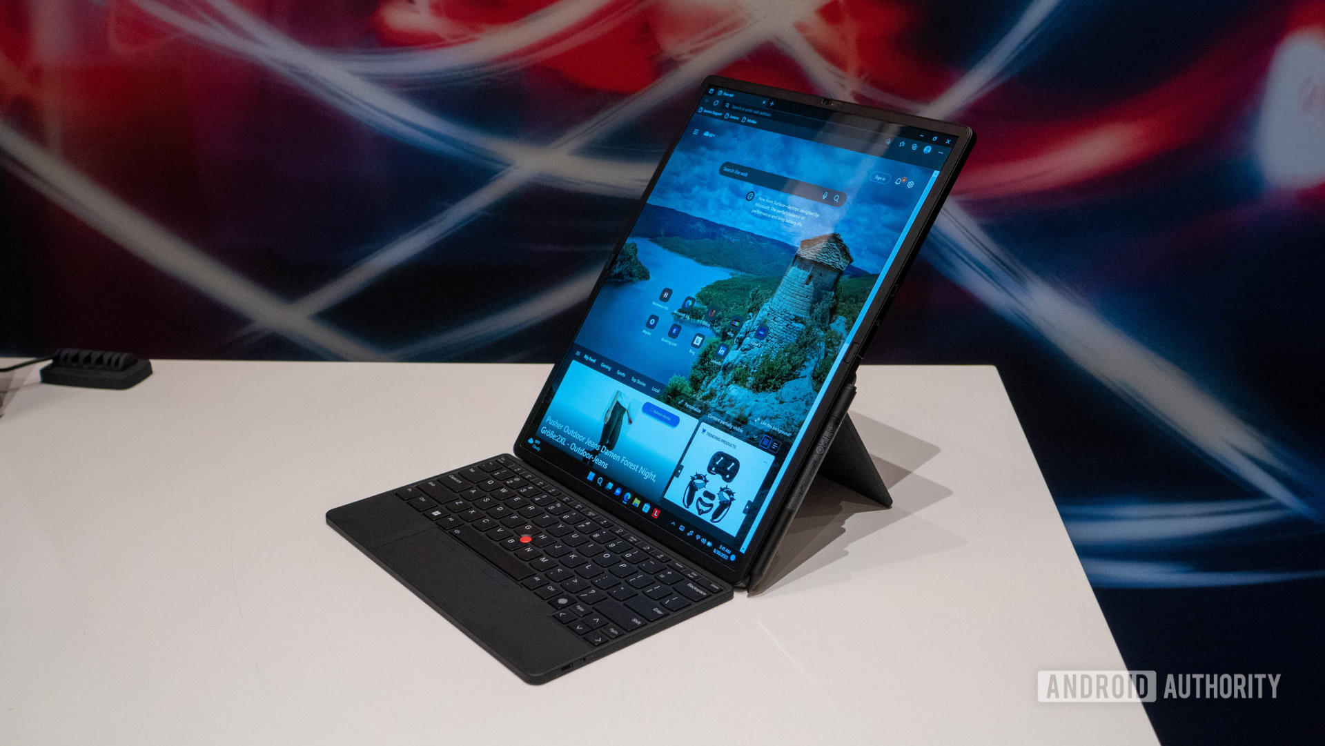Lenovo X1 Fold in portrait mode with magnetic keyboard attached side angle view