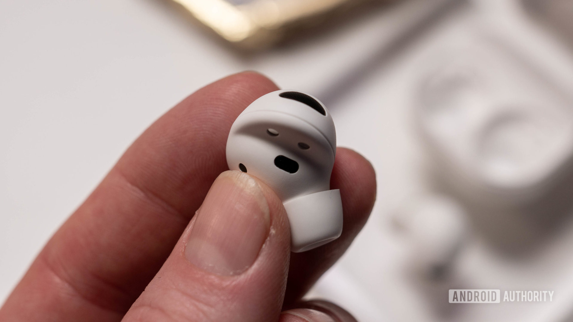 Samsung Galaxy Buds 2 Pro in white color in hand