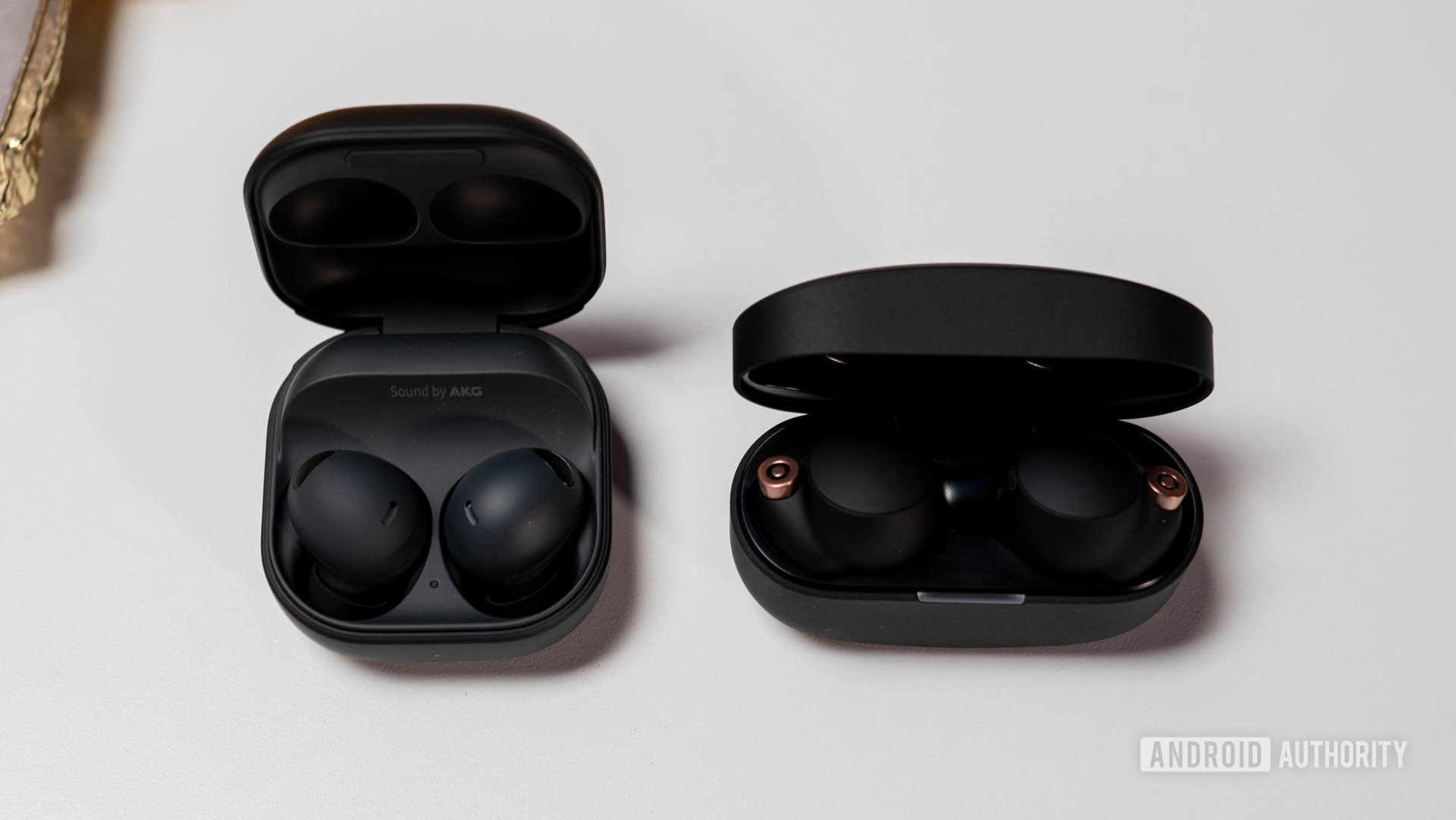 Samsung Galaxy Buds 2 Pro vs Sony WH 1000XM4 in charging cases