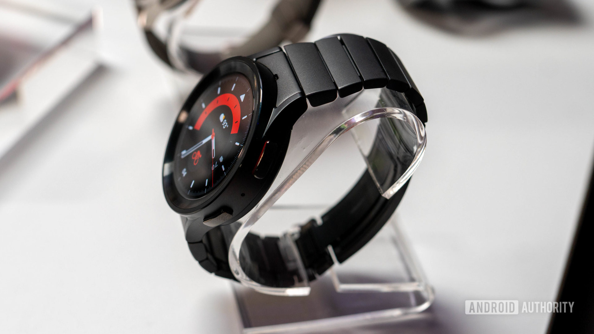 A Samsung Galaxy Watch 5 Pro rests on a display stand.